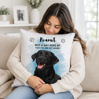Woman holding a personalized dog memorial pillow with custom pet photo, name and memorial quote